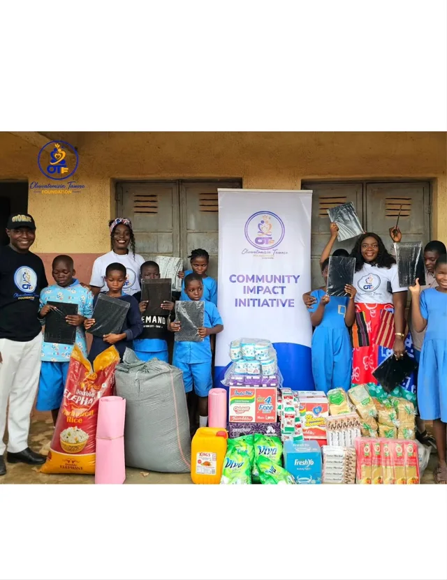 Community members and volunteers with outreach supplies.